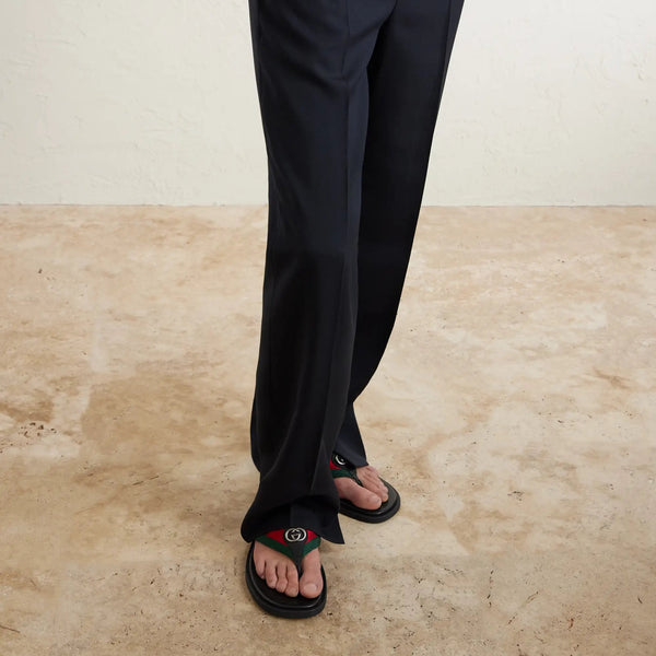 Gucci Sandalias con ribete de cuero y logotipo adornado
