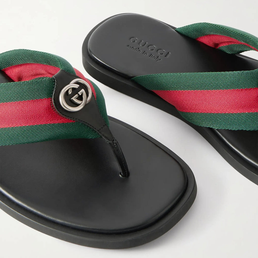 Gucci Sandalias con ribete de cuero y logotipo adornado