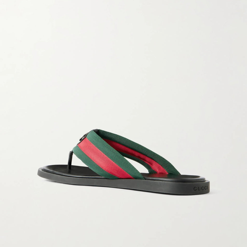 Gucci Sandalias con ribete de cuero y logotipo adornado